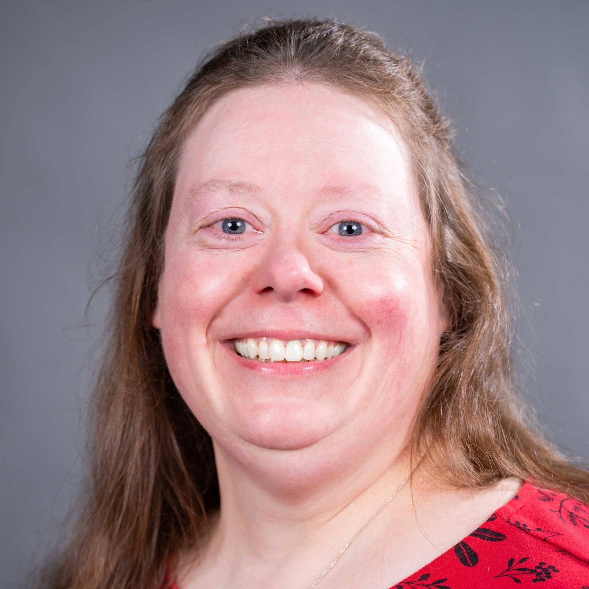 Professional Headshot of Suzanne Rousseau
